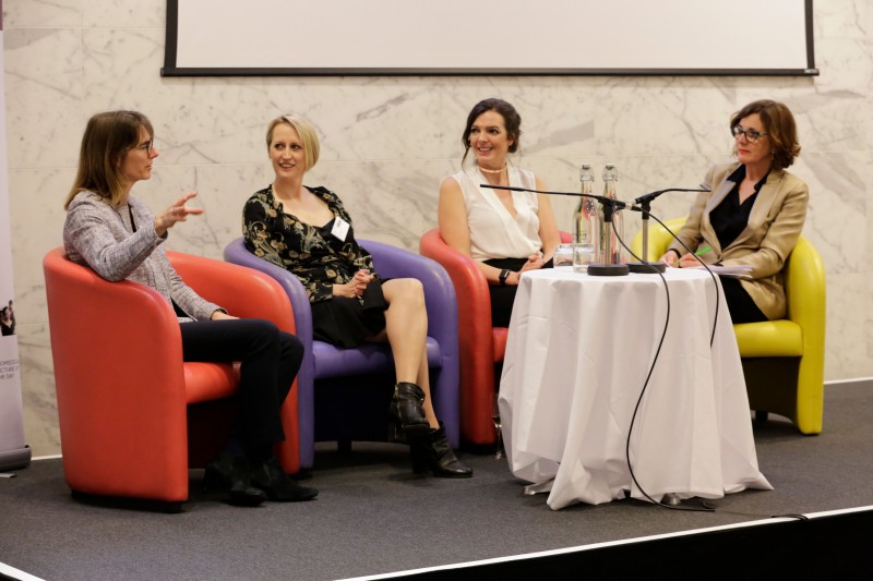 4 people on stage discussing